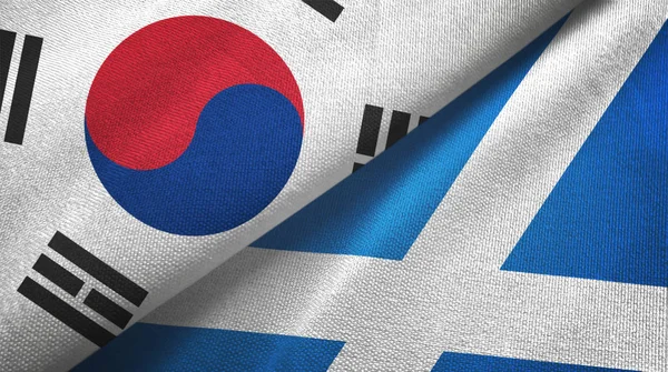 Corea del Sud e Scozia due bandiere tessuto, tessitura del tessuto — Foto Stock