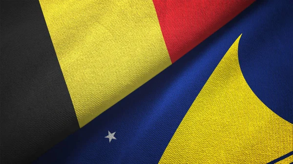 Belgio e Tokelau due bandiere tessuto, tessitura tessuto — Foto Stock