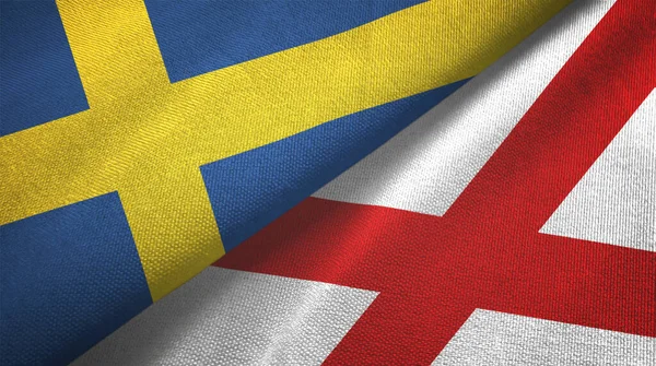 Suecia e Irlanda del Norte dos banderas tela textil, textura de la tela —  Fotos de Stock