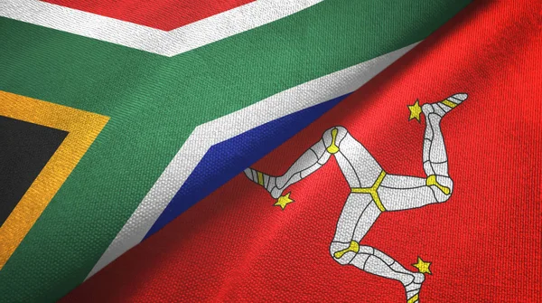 South Africa and Isle of Mann two flags textile cloth, fabric texture — Stock Photo, Image