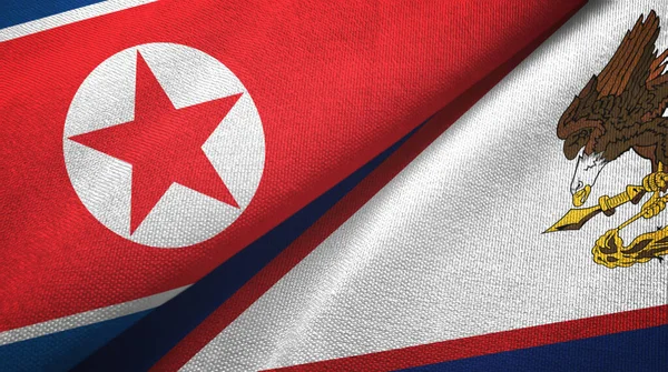 North Korea and American Samoa two flags textile cloth, fabric texture — Stock Photo, Image