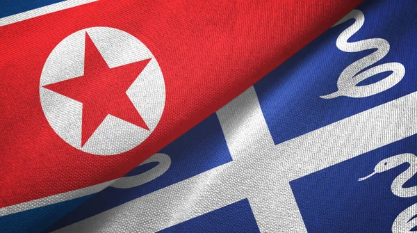 North Korea and Martinique snake two flags textile cloth, fabric texture — Stock Photo, Image