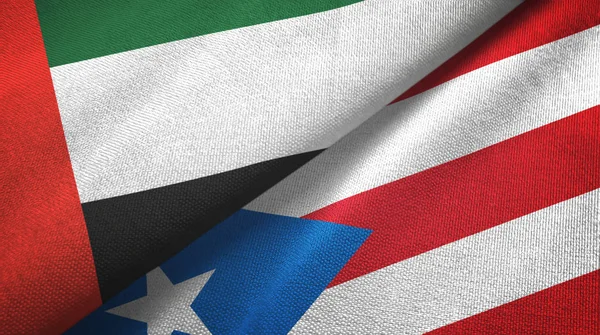 Verenigde Arabische Emiraten en Puerto Rico twee vlaggen textiel doek, stof textuur — Stockfoto