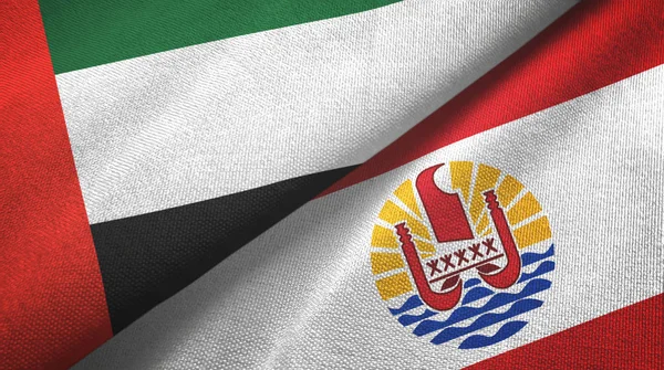 Emiratos Árabes Unidos y Polinesia Francesa dos banderas de tela textil — Foto de Stock