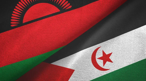 Malawi en Westelijke Sahara twee vlaggen textiel doek, stof textuur — Stockfoto