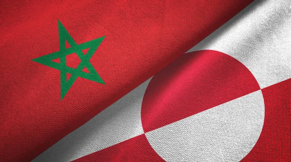 Marokko en Groenland twee vlaggen textiel doek, stof textuur — Stockfoto