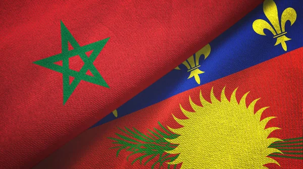 Marokko en Guadeloupe twee vlaggen textiel doek, stof textuur — Stockfoto