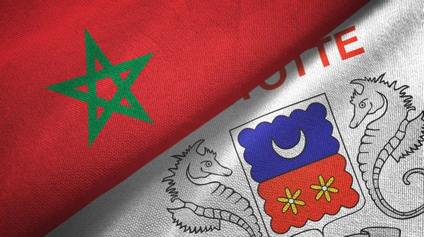 Marokko en Mayotte twee vlaggen textiel doek, stof textuur — Stockfoto