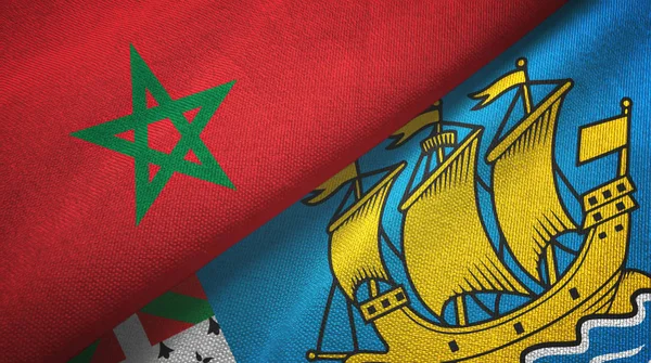 Marokko en Saint Pierre en Miquelon twee vlaggen textiel doek, stof textuur — Stockfoto