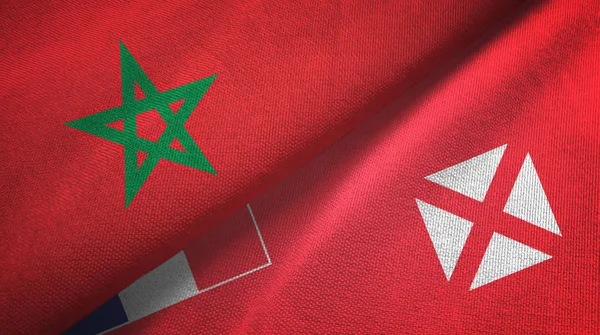 Marokko en Wallis en Futuna twee vlaggen textiel doek, stof textuur — Stockfoto