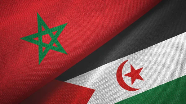 Marokko en Westelijke Sahara twee vlaggen textiel doek, stof textuur — Stockfoto