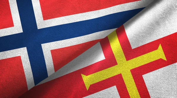 Norvegia e Guernsey due bandiere tessuto, tessitura tessuto — Foto Stock