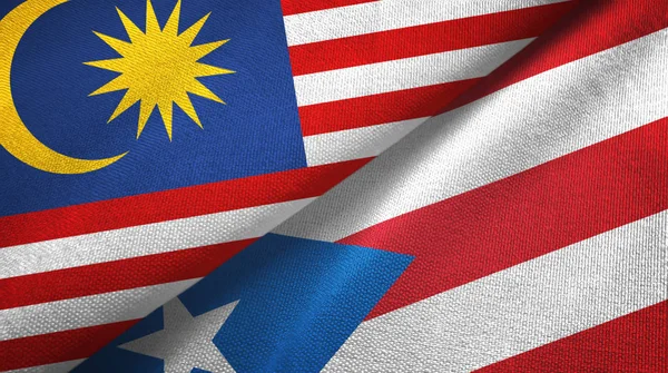 Malaysia and Puerto Rico two flags textile cloth, fabric texture — Stock Photo, Image
