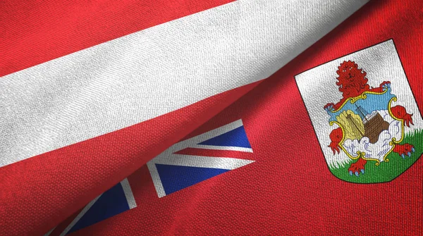 Austria y las Bermudas dos banderas tela textil, textura de la tela — Foto de Stock