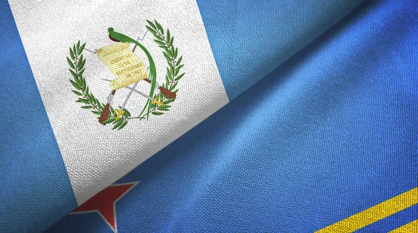 Guatemala and Aruba two flags textile cloth, fabric texture — 스톡 사진