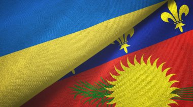 Ukraine and Guadeloupe two flags textile cloth, fabric texture