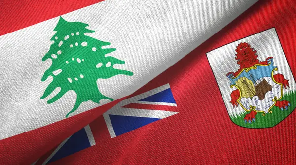 Liban et Bermudes deux drapeaux tissu textile, texture du tissu — Photo