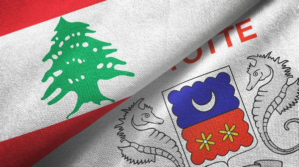 Ливан и Майотта два флага текстильная ткань, текстура ткани — стоковое фото