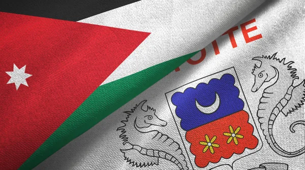 Jordania y Mayotte dos banderas tela textil, textura de la tela — Foto de Stock