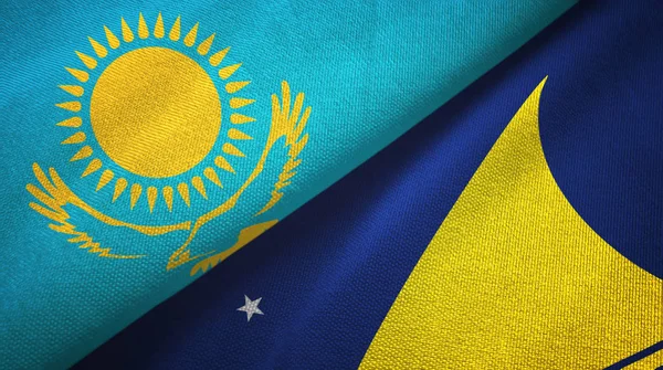 Kazakhstan and Tokelau two flags textile cloth, fabric texture — Stock Photo, Image