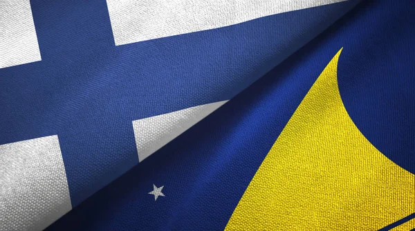Finlandia y Tokelau dos banderas tela textil, textura de la tela —  Fotos de Stock