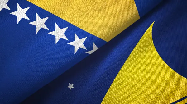 Bosnia y Herzegovina y Tokelau dos banderas tela textil, textura de la tela —  Fotos de Stock