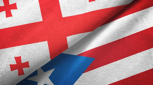 Georgia i Puerto Rico dwie flagi tkaniny tekstylne, tekstura tkaniny — Zdjęcie stockowe