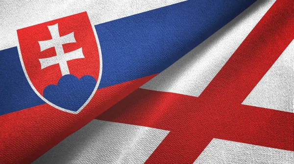 Σλοβακία και Βόρεια Ιρλανδία δύο σημαίες ύφασμα, υφάνσιμες ίνες — Φωτογραφία Αρχείου