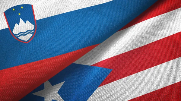 Slovenië en Puerto Rico twee vlaggen textiel doek, stof textuur — Stockfoto
