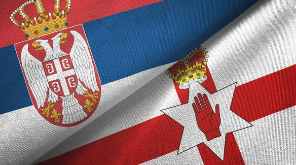 Serbia and Northern Ireland two flags textile cloth, fabric texture — 스톡 사진