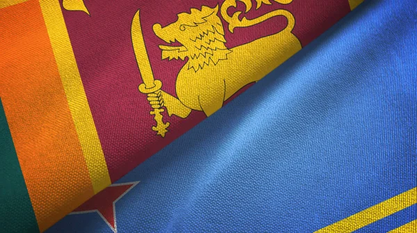 Sri lanka und aruba zwei flaggen textiltuch, textur — Stockfoto