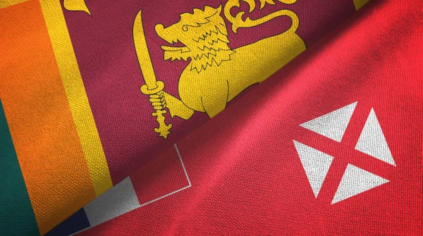 Sri lanka und wallis und futuna zwei flaggen textilstoff, textur — Stockfoto