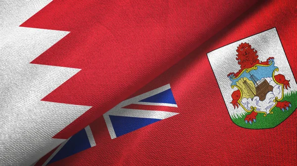 Bahrein e Bermudas duas bandeiras pano têxtil, textura de tecido — Fotografia de Stock