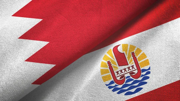 Bahrain och Franska Polynesien två flaggor textilduk, textur — Stockfoto