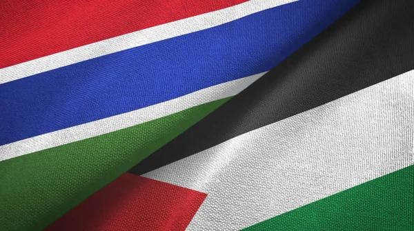 Gambia und Palestin zwei Flaggen Textiltuch, Textur — Stockfoto
