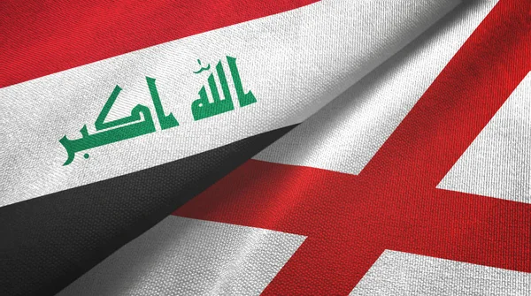 Iraq e Irlanda del Nord due bandiere tessuto, tessitura tessuto — Foto Stock