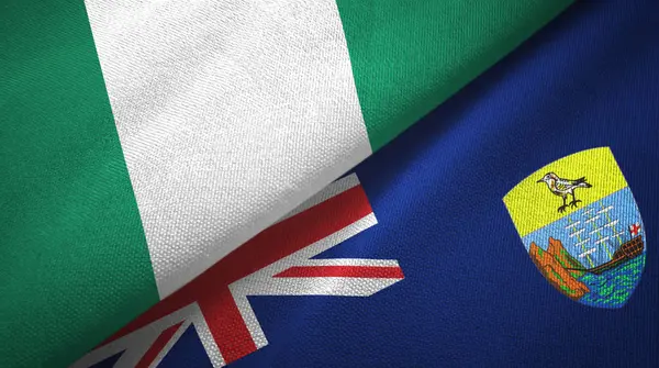Nigeria en Saint Helena twee vlaggen textiel doek, stof textuur — Stockfoto