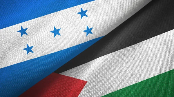 Honduras en Palestina twee vlaggen textiel doek, stof textuur — Stockfoto