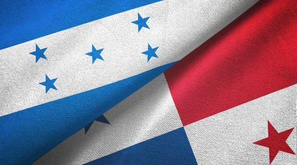Honduras en Panama twee vlaggen textiel doek, stof textuur — Stockfoto