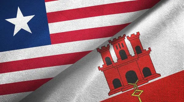Liberia i Gibraltar dwie flagi tkaniny tekstylne, tekstura tkaniny — Zdjęcie stockowe