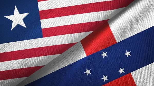 Liberia e Antille olandesi due bandiere tessuto, tessitura tessuto — Foto Stock