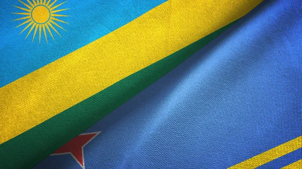 Ruanda und Ruanda zwei Flaggen Textilgewebe, Textur — Stockfoto