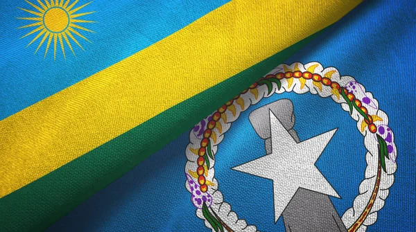 Ruanda und den nördlichen Marianen zwei Flaggen Textiltuch, Textur — Stockfoto