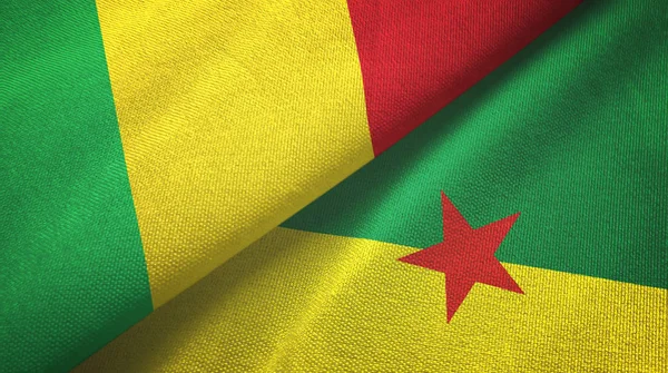 Malí y Guayana Francesa dos banderas tela textil, textura de la tela — Foto de Stock
