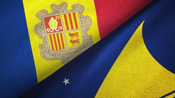 Andorra och Tokelau två flaggor textil duk, textur — Stockfoto