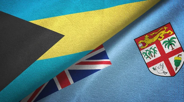 Bahamas and Fiji two flags textile cloth, fabric texture