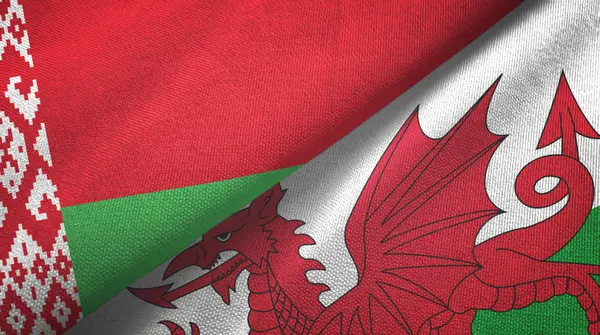 白俄罗斯和威尔士两国国旗纺织品,面料质感 — 图库照片
