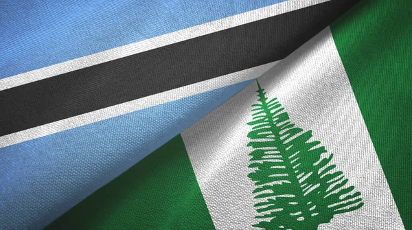 Botswana and Norfolk Island two flags textile cloth, fabric texture — 스톡 사진