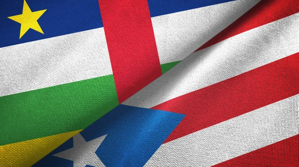 Centraal-Afrikaanse Republiek en Puerto Rico twee vlaggen textiel doek, weefsel textuur — Stockfoto