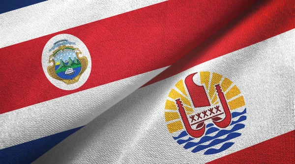 Costa Rica en Frans-Polynesië twee vlaggen textiel doek, stof textuur — Stockfoto
